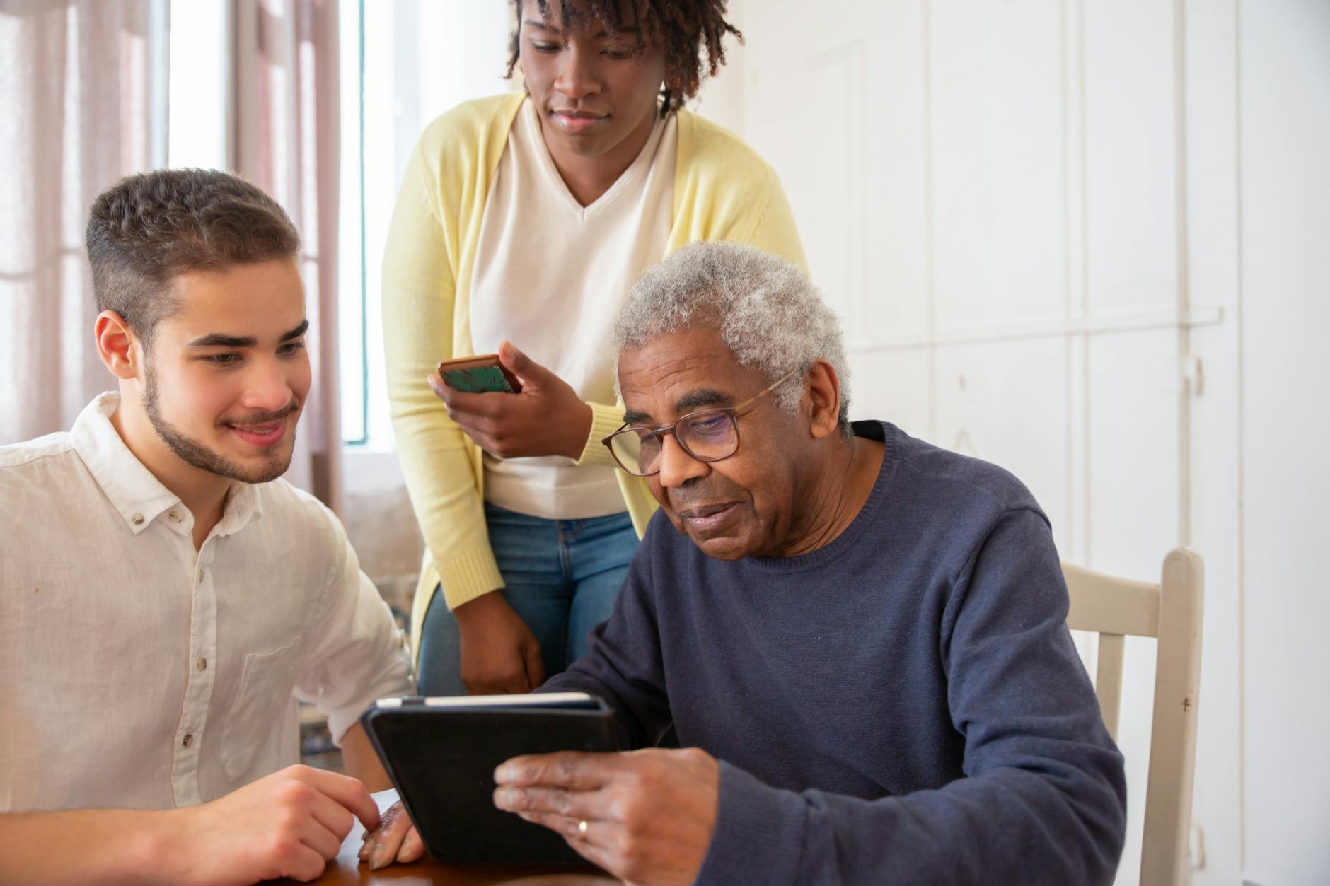 Caregiver using phone to provide 24/7 support in home environment
